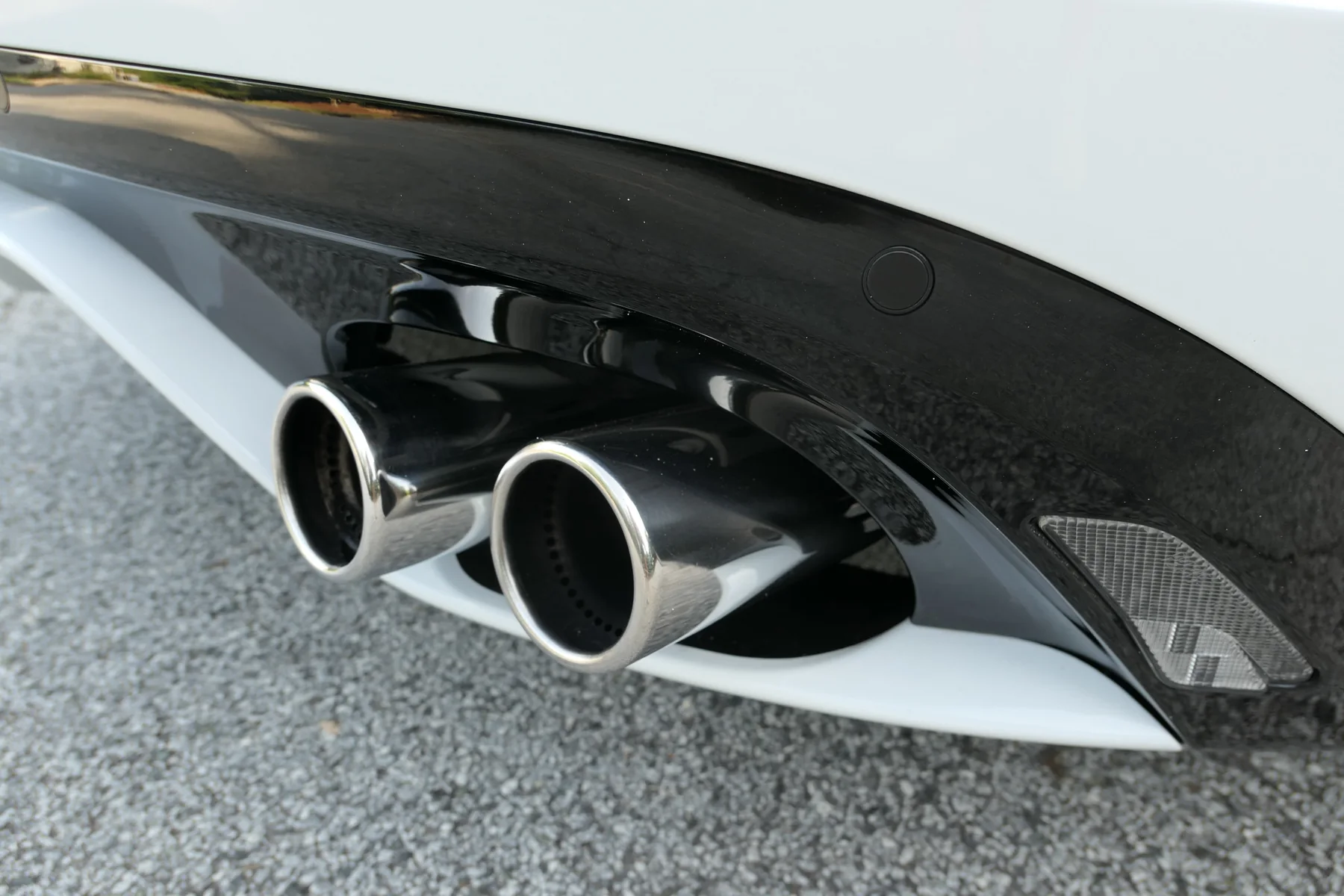 Close-up of left-side exhaust outlets