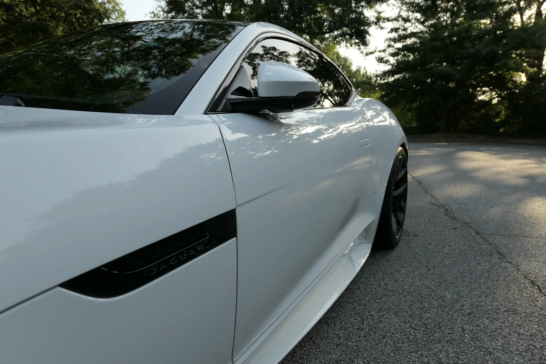 Front-side detail showing gloss-black side vent