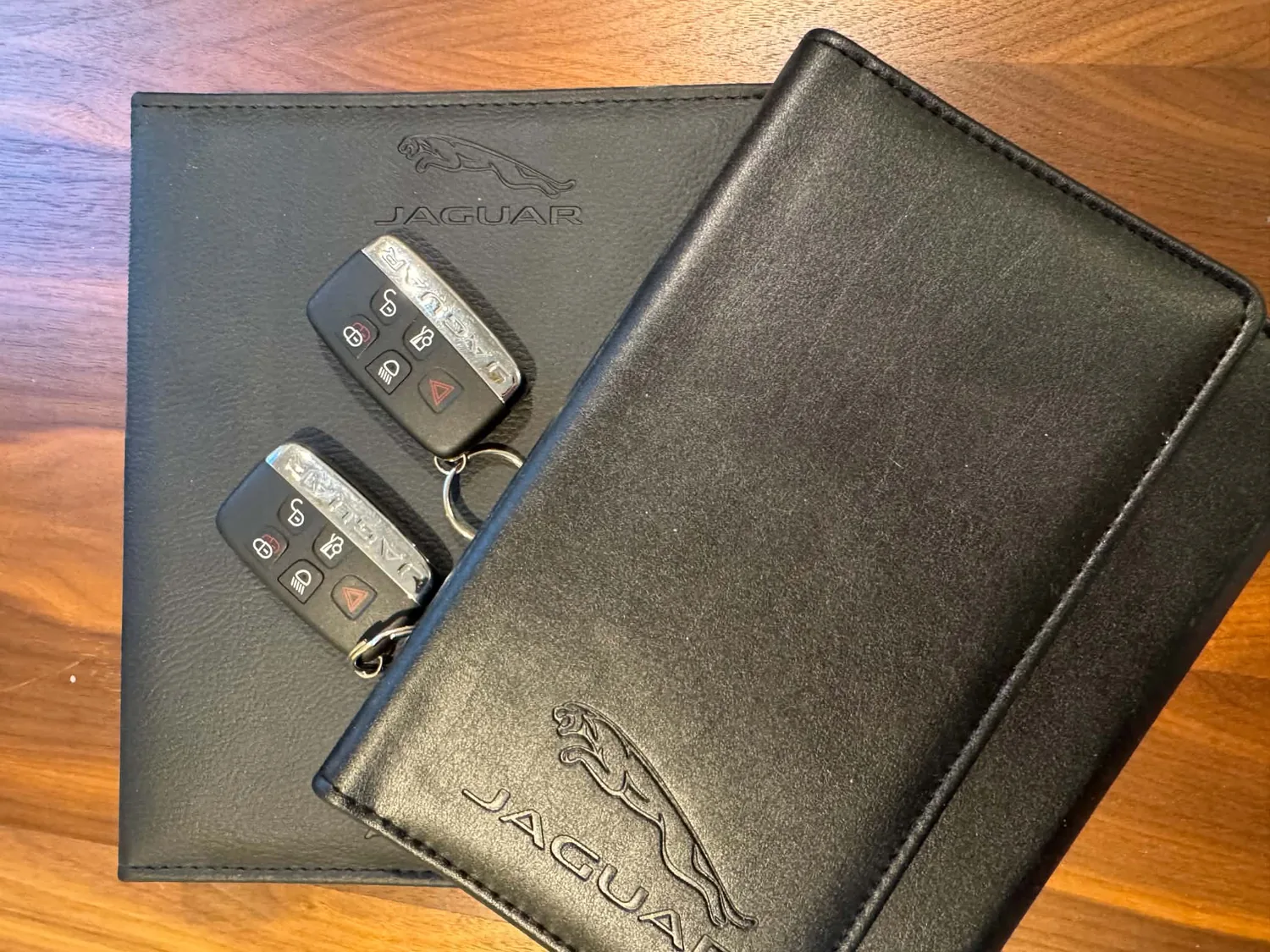 Two Jaguar keys and original document wallet